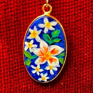 One-of-a-kind crystal gemstone pendants, hand-crafted, featuring flowers & pets.